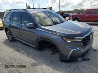 ✅ 2023 Honda Pilot Elite • VIN: 5FNYG1H84PB035375 • Lot: 67435423. Wystawiony na Copart z przebiegiem 2 293 mil. Bezpłatny archiwum sprzedaży aukcyjnych z USA i szczegółowy raport historii pojazdu na DreamBid. Zdjęcie 4.