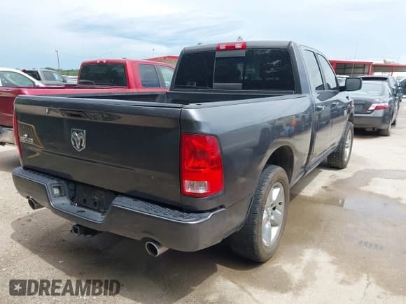 ✅ 2015 Ram 1500 SLT • VIN: 1C6RR6GT7FS742111 • Lot: 42469927. Listed on IAAI with 111,130 mi. Free auction sales archive from the USA and detailed vehicle history report at DreamBid. Image 4.