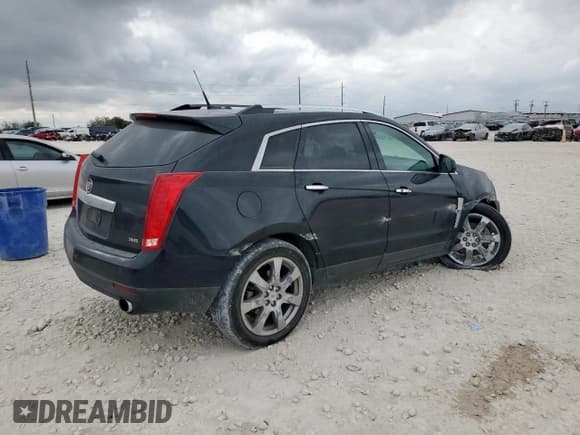✅ 2012 Cadillac SRX Performance Collection • VIN: 3GYFNEE39CS594753 • Lot: 92873555. Listed on Copart with 151,617 mi. Free auction sales archive from the USA and detailed vehicle history report at DreamBid. Image 3.