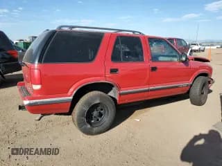 ✅ 1997 Chevrolet Blazer LS • VIN: 1GNDT13W7VK203016 • Lot: 63165315. Wystawiony na Copart z przebiegiem 123 962 mil. Bezpłatny archiwum sprzedaży aukcyjnych z USA i szczegółowy raport historii pojazdu na DreamBid. Zdjęcie 3.