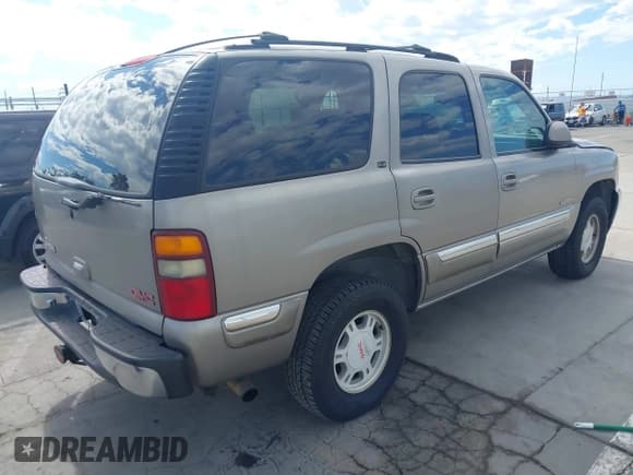 ✅ 2001 GMC Yukon SLT • VIN: 1GKEC13T41J283382 • Lot: 43426997. Wystawiony na IAAI z przebiegiem 148 536 mil. Bezpłatny archiwum sprzedaży aukcyjnych z USA i szczegółowy raport historii pojazdu na DreamBid. Zdjęcie 4.