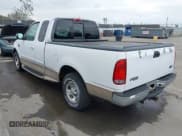 ✅ 1999 Ford F-150 XL • VIN: 1FTRX17L7XKA63863 • Lot: 43629425. Listed on IAAI with 86,931 mi. Free auction sales archive from the USA and detailed vehicle history report at DreamBid. Image 3.