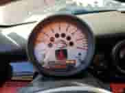 2011 MINI Hardtop with VIN WMWSU3C58BT183765, listed as a Copart auction lot 63061405 with 59,902 mi miles and Salvage title. Bid and sale history available at DreamBid. Image 9.