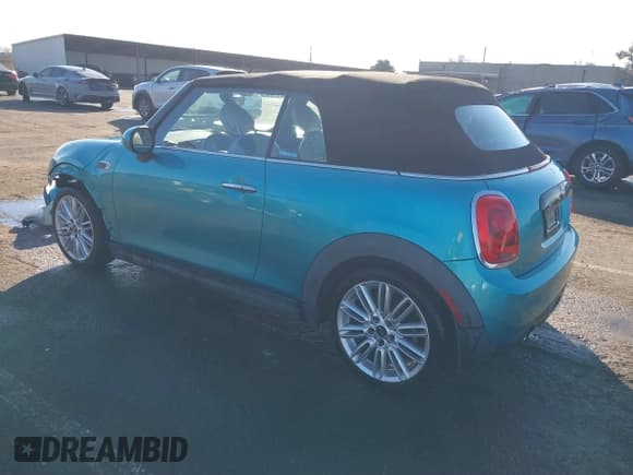 ✅ 2016 MINI Convertible • VIN: WMWWG5C50G3C19656 • Лот: 41429611. Опубликован ранее на IAAI с пробегом 60 873 миль. Бесплатный доступ к архиву аукционных продаж из США и подробный отчёт об истории автомобиля на DreamBid. Изображение 3.