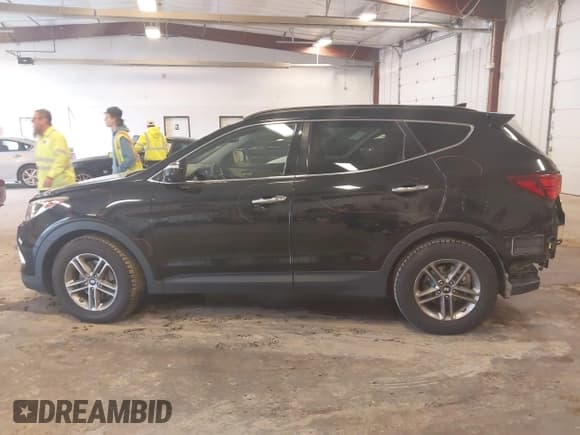 ✅ 2017 Hyundai Santa Fe 2.4L • VIN: 5XYZUDLB4HG402187 • Лот: 43535757. Опубликован ранее на IAAI с пробегом 144 085 миль. Бесплатный доступ к архиву аукционных продаж из США и подробный отчёт об истории автомобиля на DreamBid. Изображение 14.