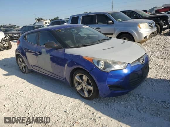 2012 Hyundai Veloster w/Red Int z VIN KMHTC6AD9CU030616, wystawiony jako Copart lot #73885774 z przebiegiem 133 935 mil mil oraz Czysty tytuł • Clean title. Historia ofert i sprzedaży dostępna na DreamBid. Obrazek 4.