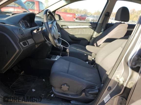 2011 Chevrolet Aveo 1LT с VIN KL1TD5DE9BB207179, выставлен на аукционе Copart как лот 82548075 с пробегом 174 446 миль миль и Списание • Salvage title. История ставок и продаж доступна на DreamBid. Изображение 7.