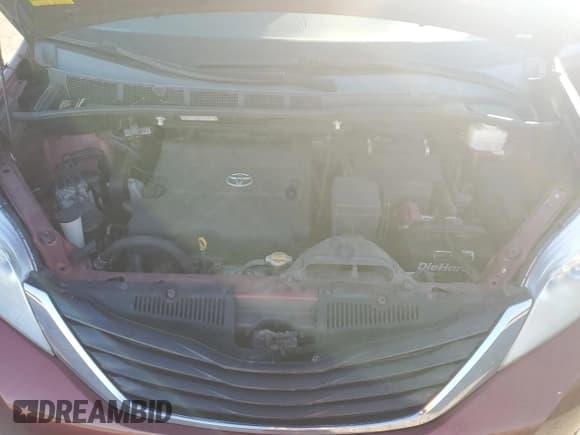 ✅ 2012 Toyota Sienna LE AAS • VIN: 5TDKK3DCXCS217873 • Lot: 84035195. Listed on Copart with 147,923 mi. Free auction sales archive from the USA and detailed vehicle history report at DreamBid. Image 12.