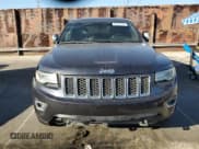 ✅ 2014 Jeep Grand Cherokee Overland • VIN: 1C4RJFCM5EC297245 • Lot: 90537745. Listed on Copart with 134,707 mi. Free auction sales archive from the USA and detailed vehicle history report at DreamBid. Image 5.