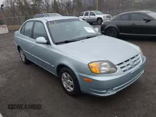 2003 Hyundai Accent GL z VIN KMHCG45C33U473080, wystawiony jako IAAI lot #41868765 z przebiegiem 57 478 mil mil oraz . Historia ofert i sprzedaży dostępna na DreamBid. Obrazek 1.