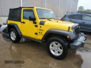 ✅ 2009 Jeep Wrangler X • VIN: 1J4FA24169L775219 • Lot: 71110304. Listed on Copart with 132,886 mi. Free auction sales archive from the USA and detailed vehicle history report at DreamBid. Image 4.