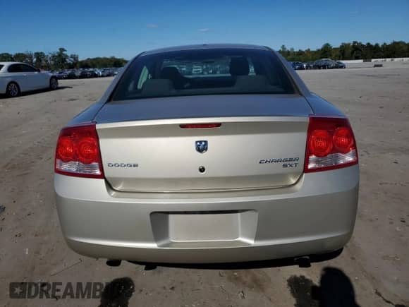 2009 Dodge Charger Police z VIN 2B3KA43T79H572065, wystawiony jako Copart lot #67554764 z przebiegiem 119 259 mil mil oraz Czysty tytuł • Clean title. Historia ofert i sprzedaży dostępna na DreamBid. Obrazek 6.