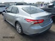 ✅ 2019 Toyota Camry LE • VIN: 4T1B11HK6KU241599 • Lot: 43236332. Listed on IAAI with 180,545 mi. Free auction sales archive from the USA and detailed vehicle history report at DreamBid. Image 3.