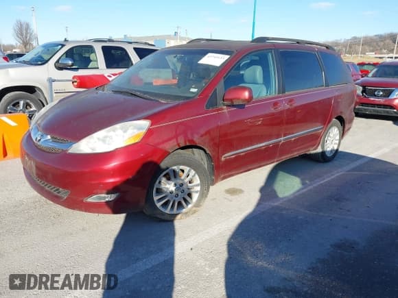 ✅ 2010 Toyota Sienna XLE • VIN: 5TDYK4CCXAS325649 • Lot: 43745133. Listed on IAAI with 130,180 mi. Free auction sales archive from the USA and detailed vehicle history report at DreamBid. Image 2.