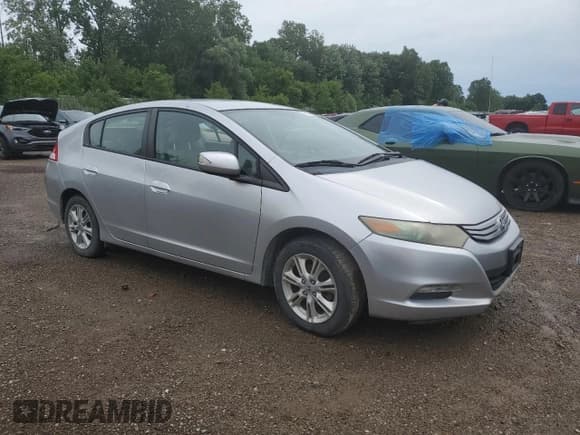 ✅ 2010 Honda Insight EX • VIN: JHMZE2H72AS041028 • Лот: 59620024. Опубликован ранее на Copart с пробегом 142 908 миль. Бесплатный доступ к архиву аукционных продаж из США и подробный отчёт об истории автомобиля на DreamBid. Изображение 4.