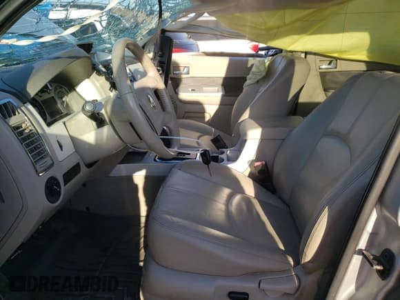 ✅ 2009 Mercury Mariner Premier • VIN: 4M2CU87789KJ23933 • Lot: 45120455. Listed on Copart with 104,465 mi. Free auction sales archive from the USA and detailed vehicle history report at DreamBid. Image 7.