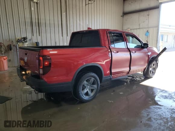 ✅ 2023 Honda Ridgeline RTL-E • VIN: 5FPYK3F70PB045641 • Лот: 86809045. Опубликован ранее на Copart с пробегом 10 599 миль. Бесплатный доступ к архиву аукционных продаж из США и подробный отчёт об истории автомобиля на DreamBid. Изображение 3.