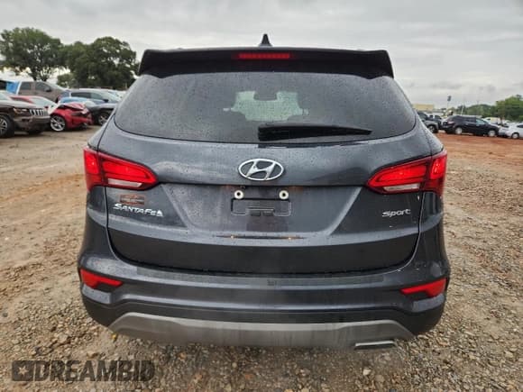 ✅ 2018 Hyundai Santa Fe 2.4L • VIN: 5XYZU3LB8JG518301 • Лот: 81795275. Опубликован ранее на Copart с пробегом 105 943 миль. Бесплатный доступ к архиву аукционных продаж из США и подробный отчёт об истории автомобиля на DreamBid. Изображение 6.