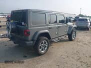 ✅ 2023 Jeep Wrangler Sahara • VIN: 1C4HJXEG1PW588576 • Lot: 42399357. Listed on IAAI with 45,745 mi. Free auction sales archive from the USA and detailed vehicle history report at DreamBid. Image 4.