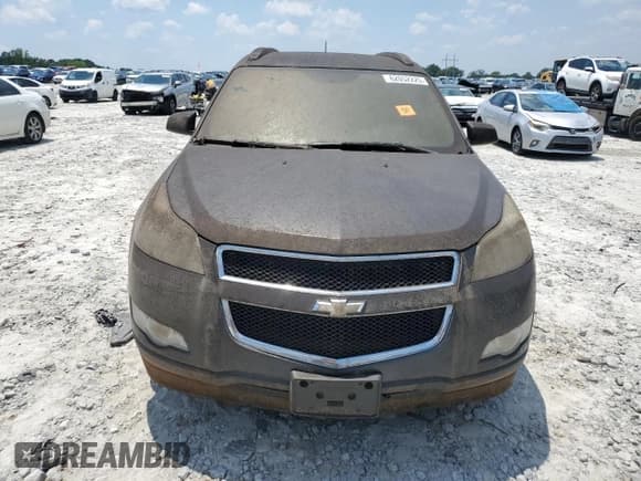 ✅ 2009 Chevrolet Traverse LS • VIN: 1GNEV13D69S162574 • Lot: 62052225. Wystawiony na Copart z przebiegiem 175 811 mil. Bezpłatny archiwum sprzedaży aukcyjnych z USA i szczegółowy raport historii pojazdu na DreamBid. Zdjęcie 5.