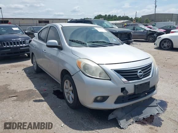 ✅ 2013 Nissan Versa S • VIN: 3N1CN7AP6DL894102 • Lot: 43109126. Listed on IAAI with 128,316 mi. Free auction sales archive from the USA and detailed vehicle history report at DreamBid. Image 1.