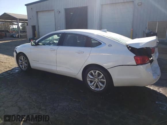 ✅ 2017 Chevrolet Impala LT • VIN: 1G1105S38HU158110 • Лот: 75851644. Опубликован ранее на Copart с пробегом 345 768 миль. Бесплатный доступ к архиву аукционных продаж из США и подробный отчёт об истории автомобиля на DreamBid. Изображение 2.