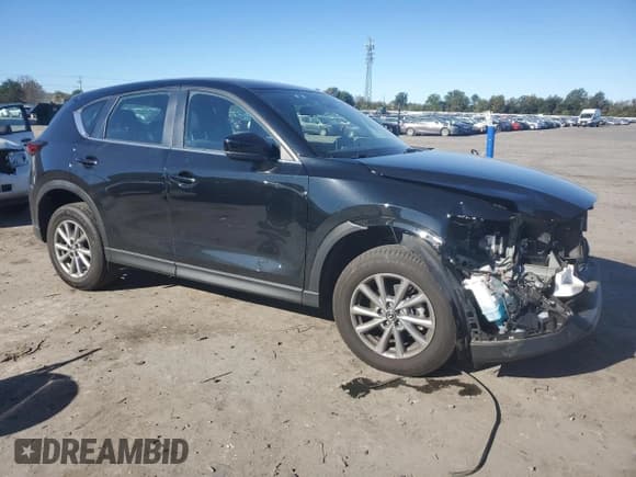 ✅ 2023 Mazda CX-5 S • VIN: JM3KFBAM0P0182840 • Лот: 86800735. Опубликован ранее на Copart с пробегом 22 570 миль. Бесплатный доступ к архиву аукционных продаж из США и подробный отчёт об истории автомобиля на DreamBid. Изображение 4.