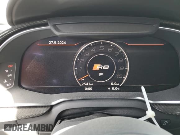 ✅ 2021 Audi R8 performance quattro • VIN: WUAKBAFX6M7901404 • Лот: 75053464. Опубликован ранее на Copart с пробегом 2 541 миль. Бесплатный доступ к архиву аукционных продаж из США и подробный отчёт об истории автомобиля на DreamBid. Изображение 9.