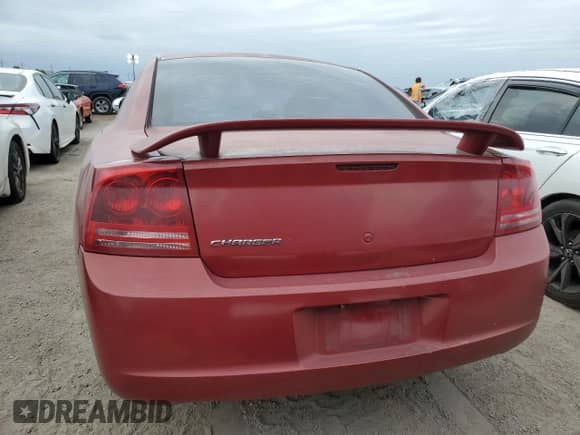 2006 Dodge Charger с VIN 2B3KA43G26H422380, выставлен на аукционе Copart как лот 76680334 с пробегом 181 643 миль миль и Списание • Salvage title. История ставок и продаж доступна на DreamBid. Изображение 6.