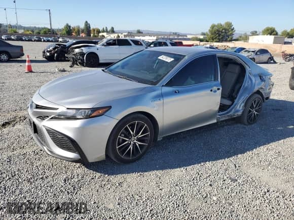 2021 Toyota Camry Hybrid SE с VIN 4T1G31AK7MU556263, выставлен на аукционе Copart как лот 84229075 с пробегом 104 650 миль миль и Списание • Salvage title. История ставок и продаж доступна на DreamBid. Изображение 1.