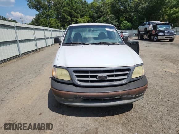 ✅ 2001 Ford F-150 XL • VIN: 1FTRF17W01NB97181 • Lot: 71320955. Listed on Copart with Not provided. Free auction sales archive from the USA and detailed vehicle history report at DreamBid. Image 5.
