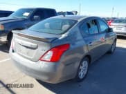 ✅ 2014 Nissan Versa SV • VIN: 3N1CN7AP0EL804797 • Lot: 43755091. Listed on IAAI with 106,169 mi. Free auction sales archive from the USA and detailed vehicle history report at DreamBid. Image 4.