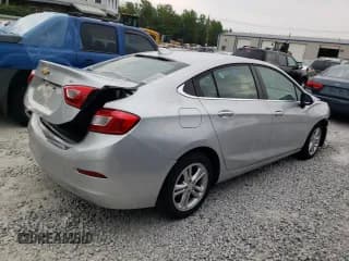 ✅ 2018 Chevrolet Cruze LT • VIN: 1G1BE5SM0J7238116 • Lot: 61329763. Listed on Copart with 74,507 mi. Free auction sales archive from the USA and detailed vehicle history report at DreamBid. Image 3.