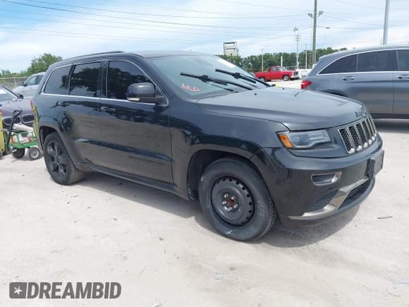 ✅ 2015 Jeep Grand Cherokee Overland • VIN: 1C4RJECG0FC242630 • Lot: 42813096. Listed on IAAI with 140,463 mi. Free auction sales archive from the USA and detailed vehicle history report at DreamBid. Image 1.
