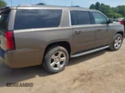 ✅ 2015 Chevrolet Suburban LT • VIN: 1GNSCJKC0FR513631 • Lot: 42879095. Wystawiony na IAAI z przebiegiem 239 851 mil. Bezpłatny archiwum sprzedaży aukcyjnych z USA i szczegółowy raport historii pojazdu na DreamBid. Zdjęcie 4.