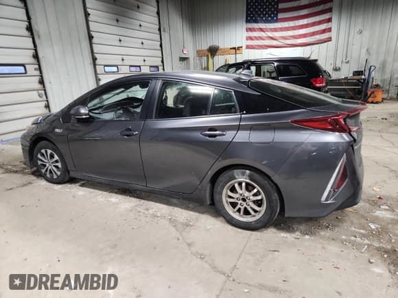 ✅ 2021 Toyota Prius XLE • VIN: JTDKAMFP8M3182178 • Lot: 93390195. Listed on Copart with Not provided. Free auction sales archive from the USA and detailed vehicle history report at DreamBid. Image 2.