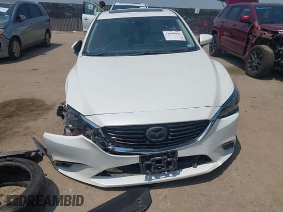✅ 2016 Mazda 6 i Grand Touring • VIN: JM1GJ1W58G1417293 • Lot: 42920092. Listed on IAAI with 125,756 mi. Free auction sales archive from the USA and detailed vehicle history report at DreamBid. Image 12.