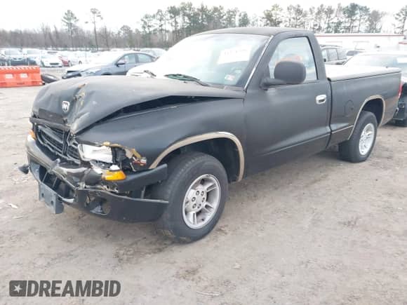 2000 Dodge Dakota with VIN 1B7FL26X8YS606213, listed as a IAAI auction lot 41371391 with 147,911 mi miles and . Bid and sale history available at DreamBid. Image 2.