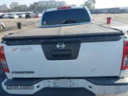 ✅ 2021 Nissan Frontier S • VIN: 1N6ED0CE9MN718282 • Lot: 41233787. Listed on IAAI with 151,670 mi. Free auction sales archive from the USA and detailed vehicle history report at DreamBid. Image 15.