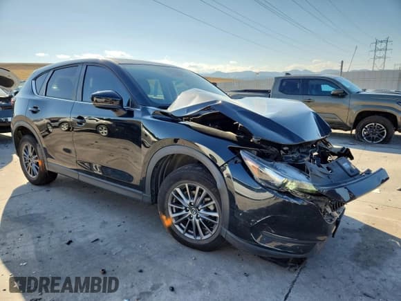 ✅ 2020 Mazda CX-5 Touring • VIN: JM3KFBCM6L0856058 • Lot: 81682095. Wystawiony na Copart z przebiegiem 24 455 mil. Bezpłatny archiwum sprzedaży aukcyjnych z USA i szczegółowy raport historii pojazdu na DreamBid. Zdjęcie 4.