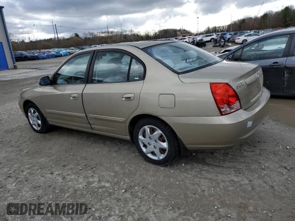 2003 Hyundai Elantra GLS z VIN KMHDN46D26U345516, wystawiony jako Copart lot #82101734 z przebiegiem 41 782 mil mil oraz Czysty tytuł • Clean title. Historia ofert i sprzedaży dostępna na DreamBid. Obrazek 2.