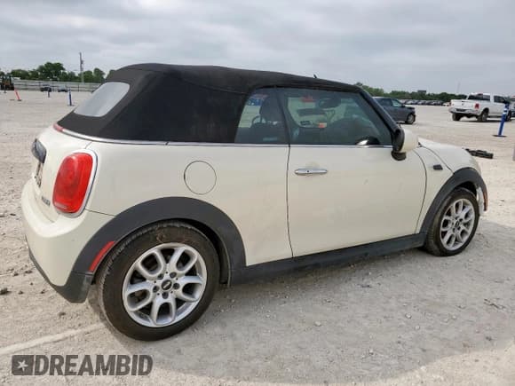 ✅ 2017 MINI Convertible Cooper • VIN: WMWWG5C32H3C20341 • Lot: 57039685. Listed on Copart with 100,575 mi. Free auction sales archive from the USA and detailed vehicle history report at DreamBid. Image 3.