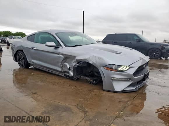 2021 Ford Mustang EcoBoost with VIN 1FA6P8TH7M5137392, listed as a Copart auction lot 64767285 with 100,212 mi miles and Salvage title. Bid and sale history available at DreamBid. Image 4.