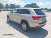 ✅ 2011 Jeep Grand Cherokee Laredo • VIN: 1J4RR4GG9BC734574 • Lot: 42603119. Listed on IAAI with 111,894 mi. Free auction sales archive from the USA and detailed vehicle history report at DreamBid. Image 3.