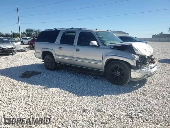 2004 Chevrolet Suburban LT z VIN 3GNEC16Z04G313261, wystawiony jako Copart lot #81499894 z przebiegiem Nie podano mil oraz Szkoda całkowita • Salvage title. Historia ofert i sprzedaży dostępna na DreamBid. Obrazek 12.