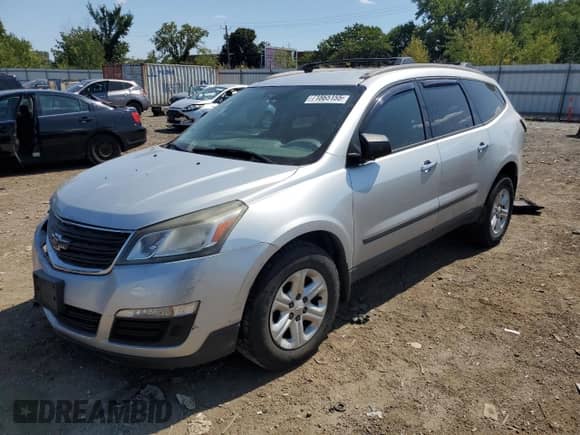 2013 Chevrolet Traverse LS with VIN 1GNKRFEDXDJ173495, listed as a Copart auction lot 71865155 with 184,329 mi miles and Salvage title. Bid and sale history available at DreamBid. Image 1.