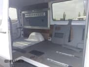 ✅ 2015 Mercedes-Benz Sprinter Crew • VIN: WD4PE7DC1F5963522 • Lot: 43270173. Wystawiony na IAAI z przebiegiem 163 436 mil. Bezpłatny archiwum sprzedaży aukcyjnych z USA i szczegółowy raport historii pojazdu na DreamBid. Zdjęcie 8.