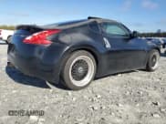 ✅ 2009 Nissan 370Z • VIN: JN1AZ44EX9M404083 • Lot: 91008375. Listed on Copart with 185,773 mi. Free auction sales archive from the USA and detailed vehicle history report at DreamBid. Image 3.