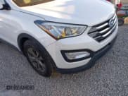✅ 2014 Hyundai Santa Fe • VIN: 5XYZUDLB8EG223579 • Lot: 43887430. Listed on IAAI with 181,075 mi. Free auction sales archive from the USA and detailed vehicle history report at DreamBid. Image 6.