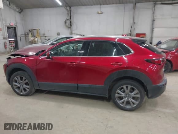 ✅ 2022 Mazda CX-30 S Premium • VIN: 3MVDMBDL0NM412458 • Lot: 43196761. Wystawiony na IAAI z przebiegiem 24 089 mil. Bezpłatny archiwum sprzedaży aukcyjnych z USA i szczegółowy raport historii pojazdu na DreamBid. Zdjęcie 14.